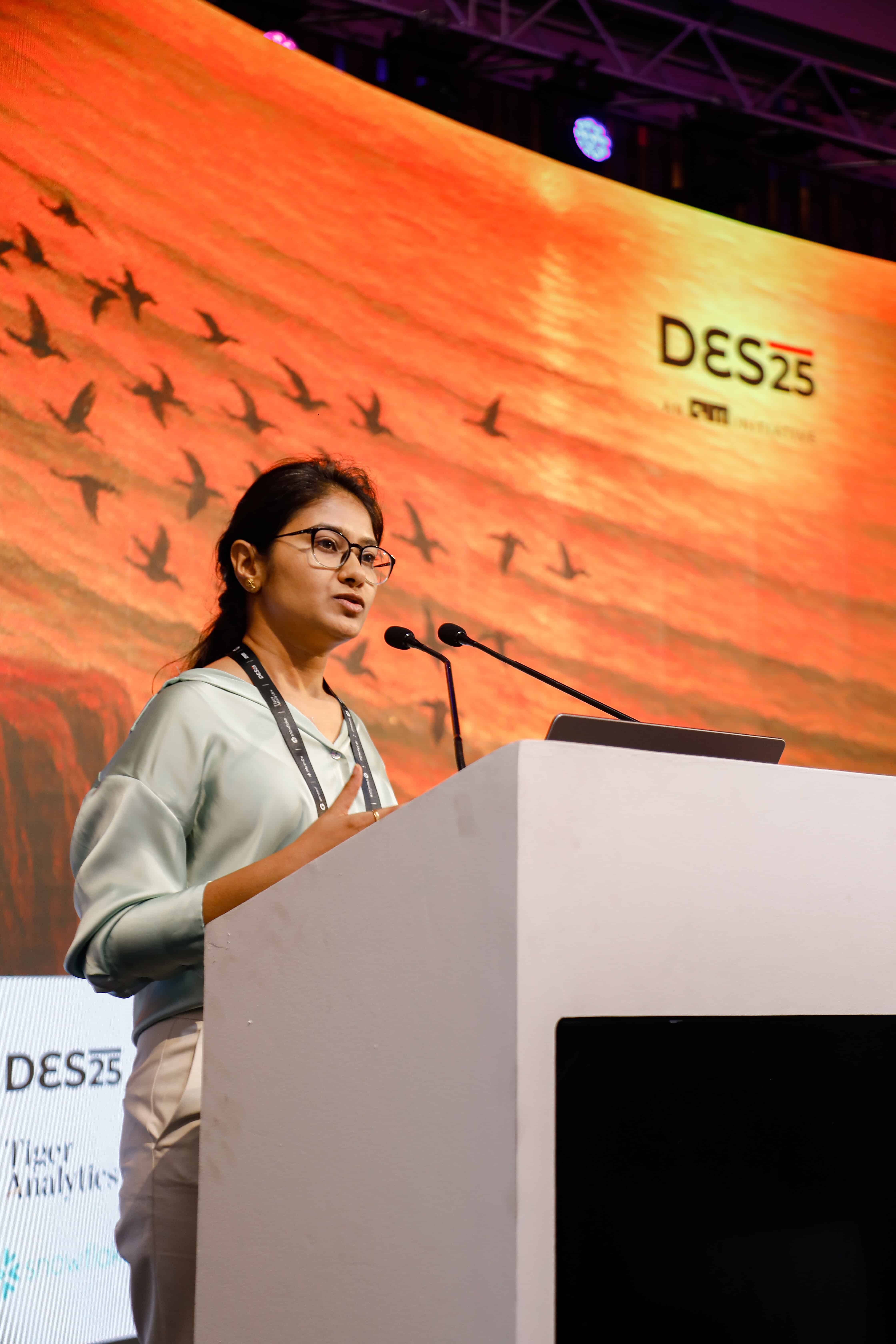 Speaker presenting at Data Engineering Summit 2026 on data analytics and technology.